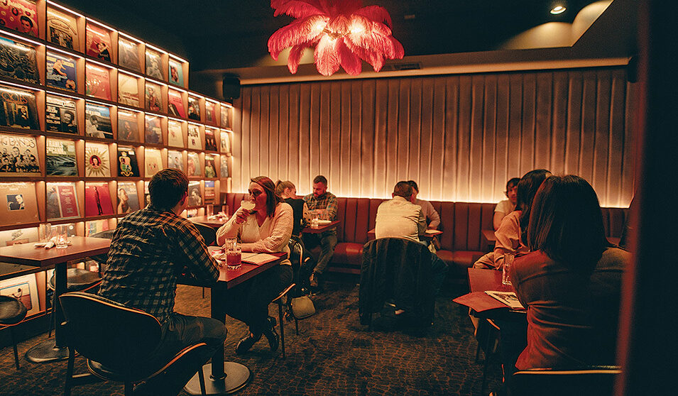 Lola's Hi/Lo Lounge's space on North Sherman Avenue in Madison, Wisconsin is moody but welcoming, with a 1960s feel and a record collection to match the era.