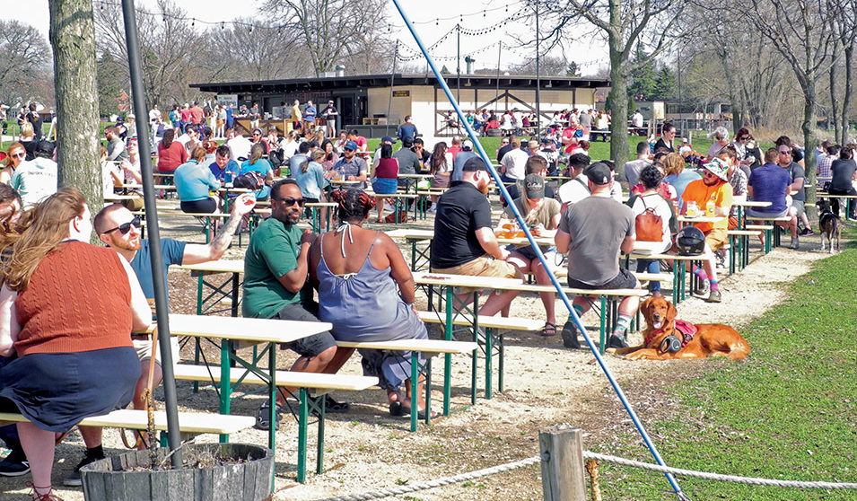 Tables full of patrons on warm days at the Olbrich Park biergarten.