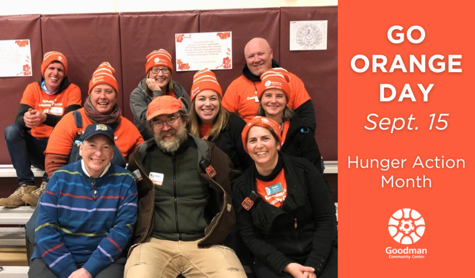 A group of Goodman Center volunteers pose as a group on bleachers. Many are wearing orange. Text on image reads: Go Orange Day, Sept 15, Hunger Action Month