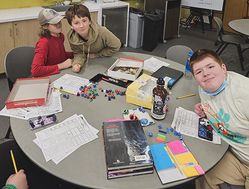 Members of Goodman Community Center's middle school Dungeons and Dragons club prepare to start a new adventure.