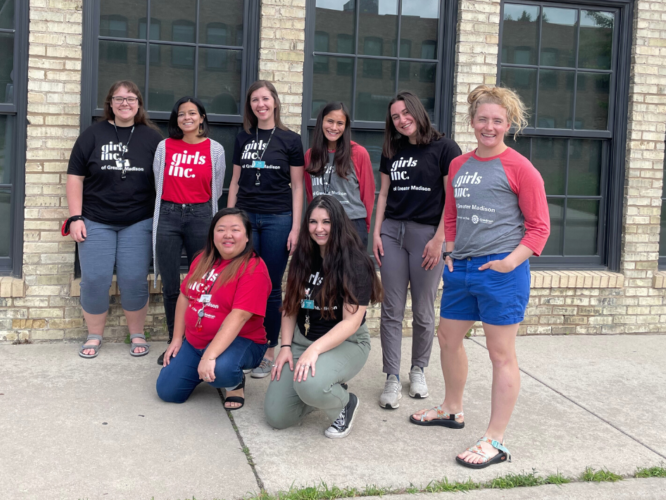 Girls Inc. of Greater Madison staff for Summer 2022 pose in front of the Goodman Center Ironworks building.