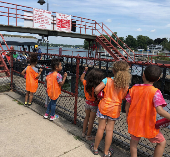 A group of preschool students visit the Tenney Locks.