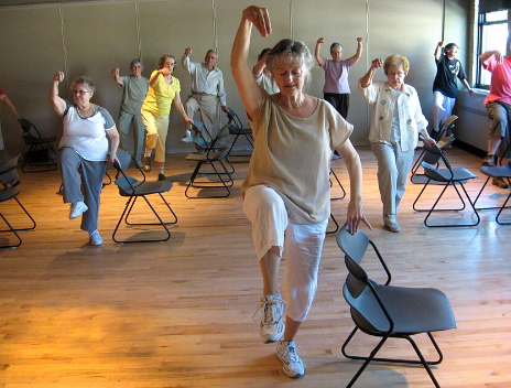 A group of older adults participating in an exercise class.